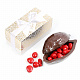 Какао боб из горького шоколада с драже "Клубника" в белом шоколаде с красным декором